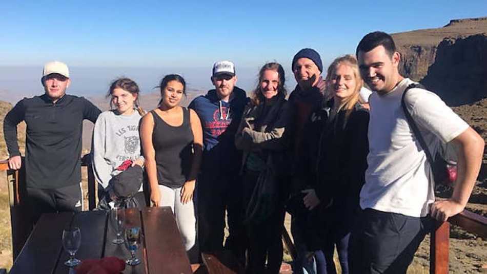 Jake (left) and his team at the highest pub in Africa!